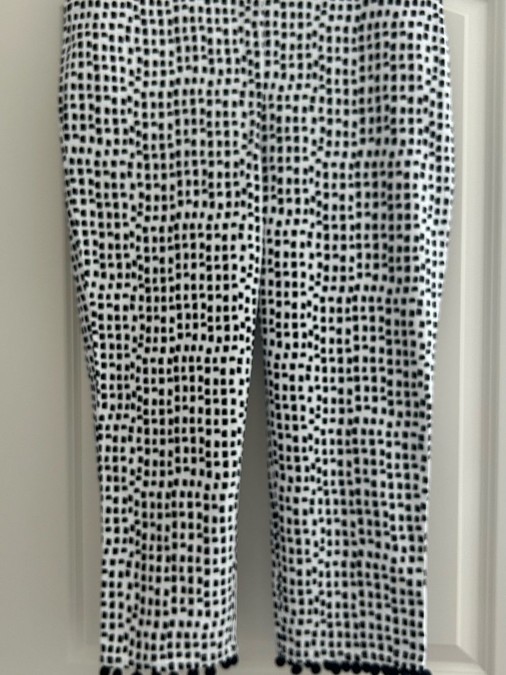 Chico's Black and White Dot-Grid women’s pant. Playful Pom detail at the hem.